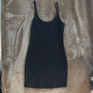 Black, short-fitted dress. Size: x-small